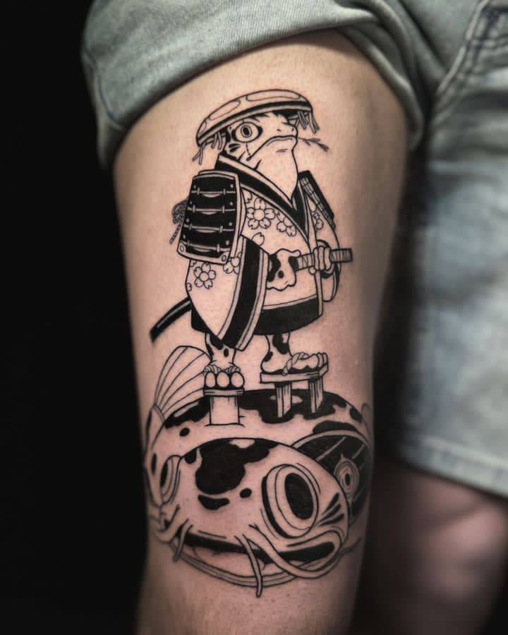 tatouage grenouille samouraï  sur un poisson chat