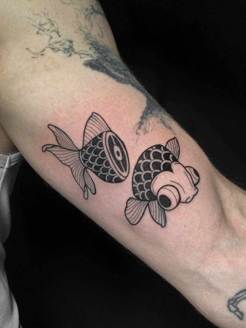 tatouage poisson coupé en 2